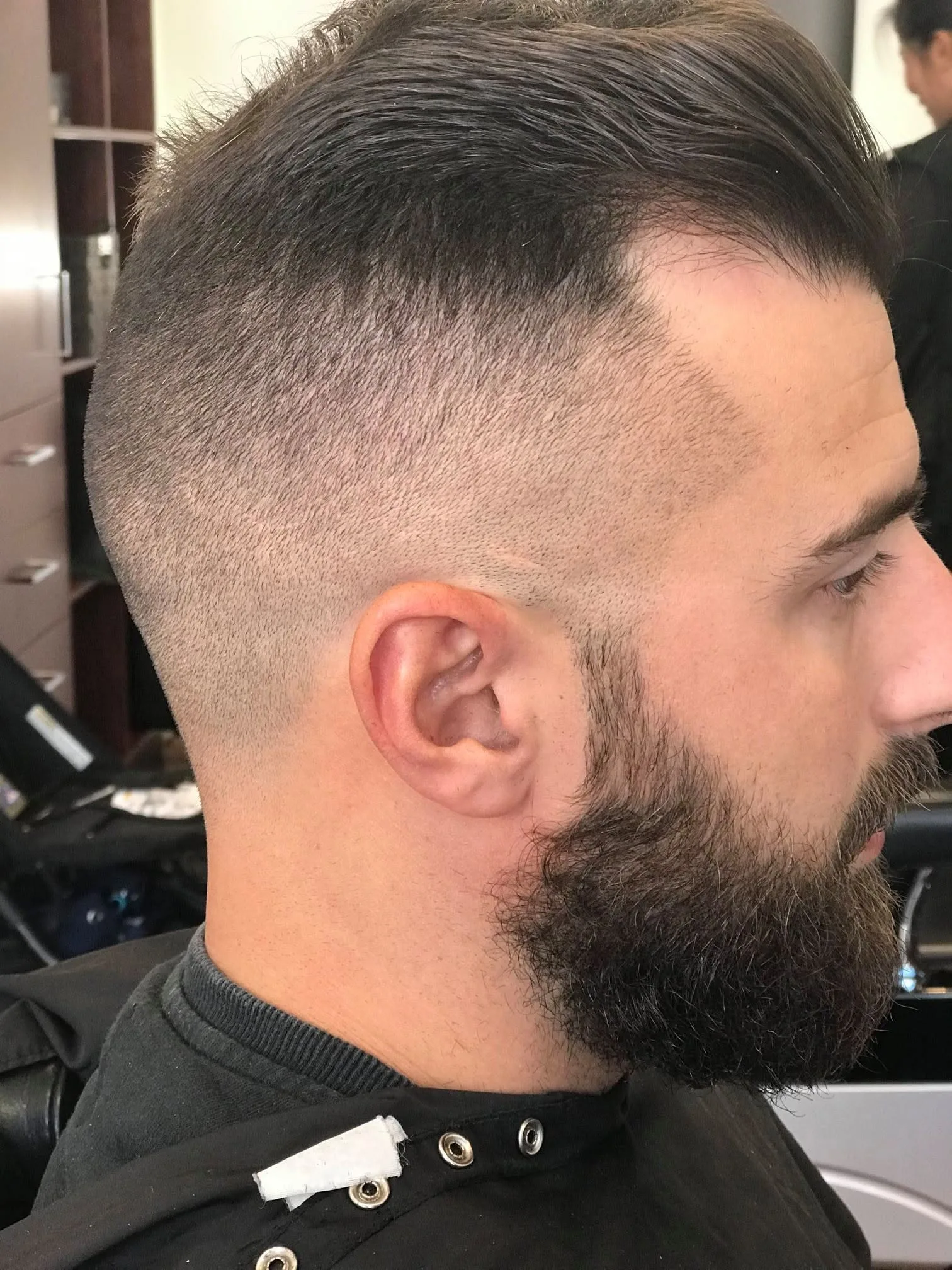 Finished tight skin fade with a full beard