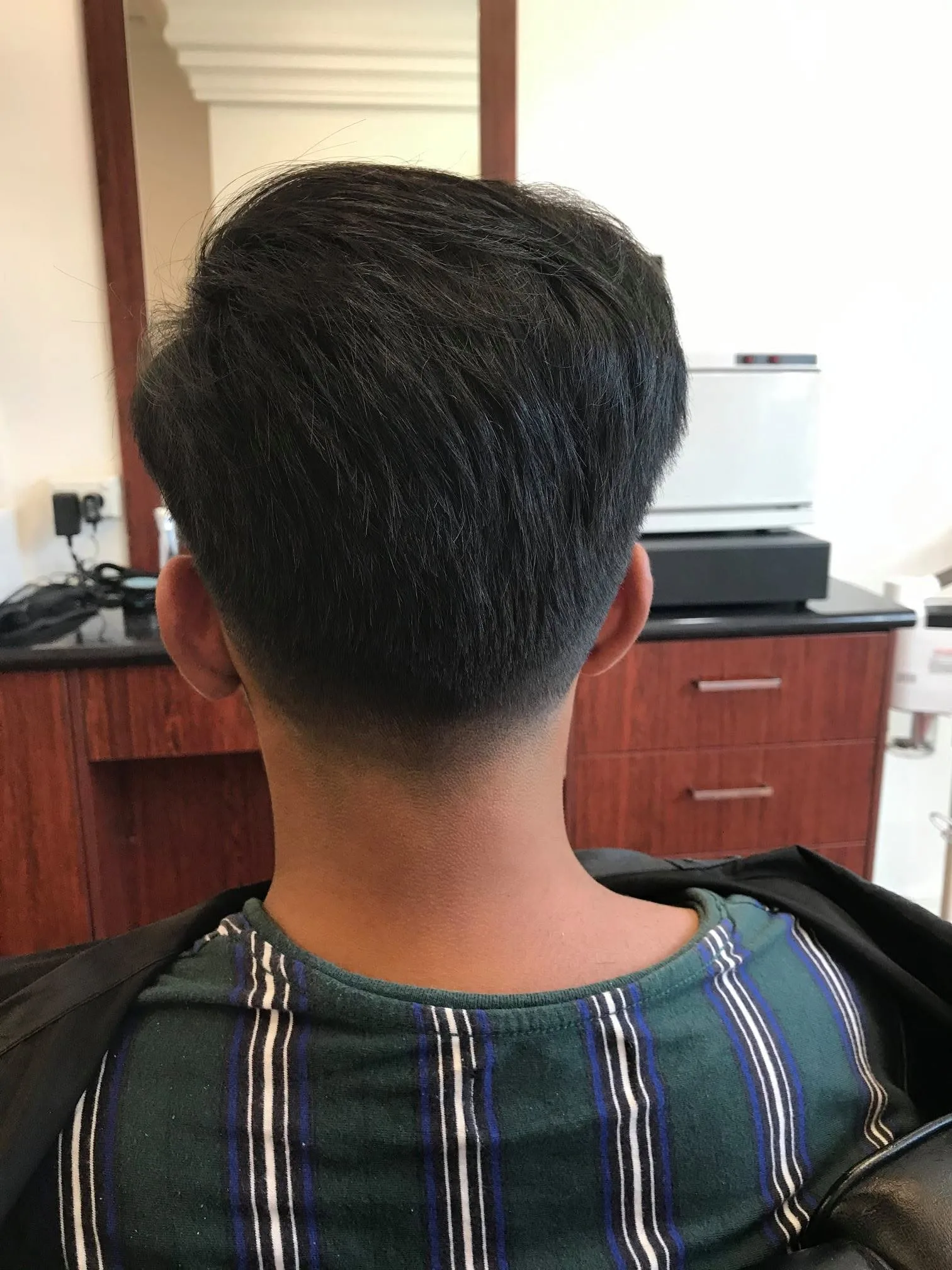 Back of a client's finished textured taper