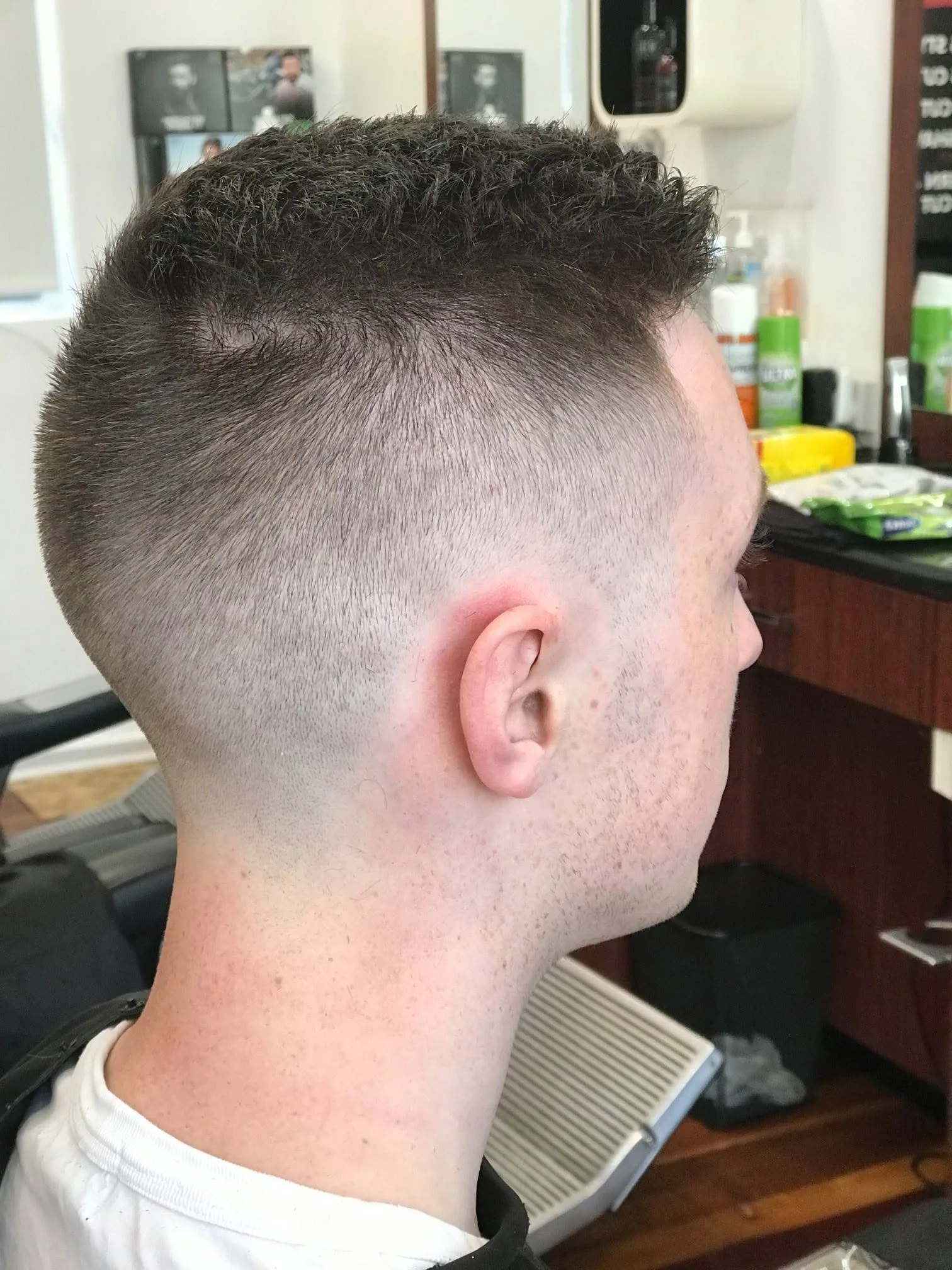 Profile — short crop with high skin fade